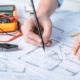 Engineer working on electrical plan for building