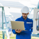 Professional electriciian working on electrical box